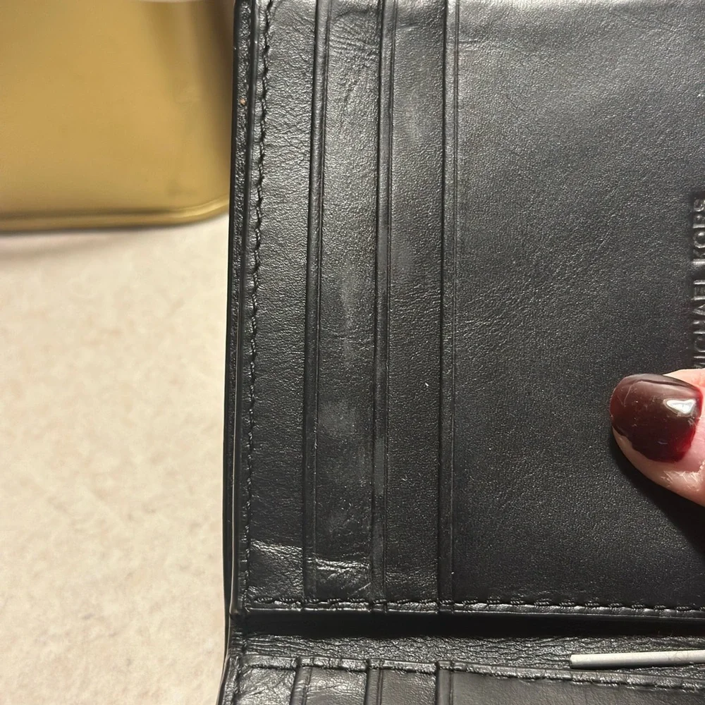 Michael Kors Cooper bilfold bifold wallet. Black and white. Used, mild wear